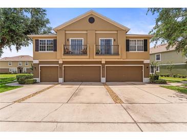 Inviting townhome with attached garages and private balconies in a well-maintained community at 1469 Broken Oak Dr # 43A, Winter Garden, FL 34787