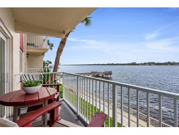 Enjoy water views from this cozy balcony with table and chairs, perfect for relaxing outdoors at 2711 N Halifax Ave # 264, Daytona Beach, FL 32118