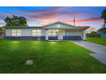 Charming single-story home with a spacious front yard and inviting curb appeal at 1612 W Grant St, Orlando, FL 32805