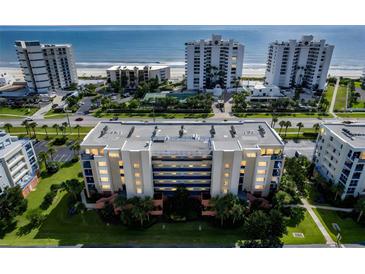 Stunning oceanfront condo building offering breathtaking views and luxurious amenities at 5300 S Atlantic Ave # 12-401, New Smyrna Beach, FL 32169