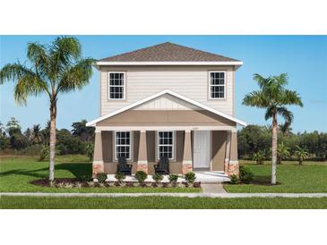 Charming two-story home with manicured lawn and decorative stone accents around the front porch at 3786 Sky Mountain Aly, Apopka, FL 32712
