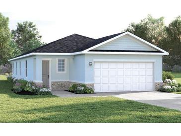 Charming single-Gathering home with a two-car garage and well-maintained lawn at 5000 Balsam Falls Rd, Deland, FL 32724