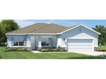 Charming single-story home with light blue exterior, stone accents, and a two-car garage at 9836 Pine Mill Ct, Clermont, FL 34711