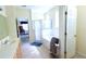 Bathroom with double sinks, tub, and shower with view into bedroom at 255 Royal Palm Dr, Davenport, FL 33837