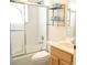 Practical bathroom with a shower-tub combination and vanity, offers essential amenities for daily use at 255 Royal Palm Dr, Davenport, FL 33837