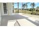 Large, screened-in patio, providing a serene outdoor living space with ample room for entertaining and enjoying the beautiful views at 255 Royal Palm Dr, Davenport, FL 33837