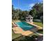 Backyard pool features a slide and gazebo with ample outdoor seating at 1116 W Line St, Leesburg, FL 34748