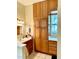 Bathroom featuring a sink, cabinet and window letting in plenty of natural light at 850 Eden Dr, Saint Cloud, FL 34771