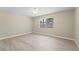 Neutral bedroom with a ceiling fan, one window, and laminate flooring at 3240 Flamingo Ln, Mulberry, FL 33860