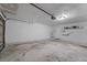 Unfinished garage space, ready to be customized to your specific needs and storage solutions at 3240 Flamingo Ln, Mulberry, FL 33860
