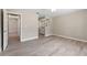 Main bedroom features light laminate flooring and a vanity area at 3240 Flamingo Ln, Mulberry, FL 33860