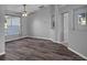 Dining room features hardwood floors and a window with curtains at 518 Marion Oaks Trl, Ocala, FL 34473