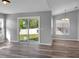 Dining area with hardwood floors and sliding glass doors to backyard at 518 Marion Oaks Trl, Ocala, FL 34473