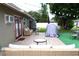 Patio with seating area, string lights, and artificial turf at 11432 Cardiff Dr, Orlando, FL 32837