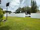 Backyard with basketball hoop and privacy fence at 11432 Cardiff Dr, Orlando, FL 32837