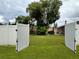 View of backyard through open gates at 11432 Cardiff Dr, Orlando, FL 32837