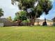 Spacious backyard with swing set and basketball hoop at 11432 Cardiff Dr, Orlando, FL 32837