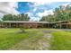 Exterior shot of horse barn, showing paddock and access at 4292 Sw 73Rd Trl, Bushnell, FL 33513