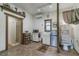 This main room includes a kitchenette with microwave, mini fridge, a full bathroom, and air conditioning at 4292 Sw 73Rd Trl, Bushnell, FL 33513