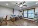 Craft room or office space featuring hardwood floors, large windows, and ample lighting at 4292 Sw 73Rd Trl, Bushnell, FL 33513