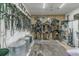 Organized tack room with storage for saddles, bridles, and equestrian equipment at 4292 Sw 73Rd Trl, Bushnell, FL 33513