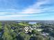 Scenic aerial shot of a community near a lake under a clear sky at 5337 Jacob Ave, Polk City, FL 33868
