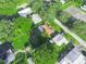 Aerial view showing property with lawn and shade trees in a residential neighborhood at 5337 Jacob Ave, Polk City, FL 33868