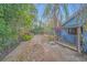A spacious backyard featuring a patio, ideal for outdoor living and entertaining at 8847 Rose Hill Dr, Orlando, FL 32818