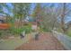The backyard features multiple decks and lush landscaping, perfect for relaxing outdoors at 8847 Rose Hill Dr, Orlando, FL 32818