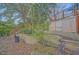 A terraced backyard with multiple decks provides ample space for outdoor enjoyment at 8847 Rose Hill Dr, Orlando, FL 32818