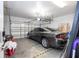 Spacious garage featuring ample storage and a modern gray sedan, offering both practicality and style at 7036 Mapperton Dr, Windermere, FL 34786