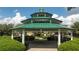 Picturesque gazebo with a green roof, offering a peaceful retreat in a communal area at 7036 Mapperton Dr, Windermere, FL 34786