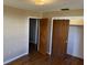 Bright bedroom with wood floors and built-in closet at 766 Bates Sw Ave, Winter Haven, FL 33880