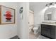 Bathroom featuring granite countertop vanity and decor at 1548 Astoria Arbor Ln, Orlando, FL 32824