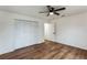 Spacious bedroom with ceiling fan and closet at 1228 Se 17Th St, Ocala, FL 34471