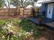 Large backyard with wooden fence and stone landscaping at 504 Shiloh St, Fruitland Park, FL 34731