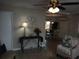 Open living space showcasing a dining area and access to the backyard at 504 Shiloh St, Fruitland Park, FL 34731