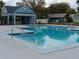 Community pool with fences and a covered area at 3110 Port Royal Dr, Orlando, FL 32827