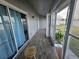 Screened-in porch with tile flooring and sliding doors at 4520 Summergrove Ave, Orlando, FL 32812