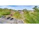 Community aerial view shows a playground, parking, and lush green landscape at 1301 Tuscan Ter # 9401, Davenport, FL 33896