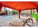 Poolside cabana with lounge chairs overlooking a beautiful fountain and sparkling pool at 1301 Tuscan Ter # 9401, Davenport, FL 33896
