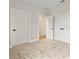 Bedroom featuring carpet and closet with double doors at 3022 Peel Ave, Orlando, FL 32806