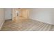 Bright living room featuring wood-look floors at 4213 S Semoran Blvd # 9, Orlando, FL 32822