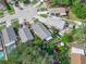 Aerial perspective of neighborhood featuring houses, yards, and street at 2907 Willow Oak Ct, Kissimmee, FL 34744