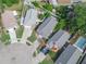 Aerial view of houses with gray roofs in a residential neighborhood at 2907 Willow Oak Ct, Kissimmee, FL 34744