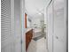 Elegant bathroom with double sinks, granite countertop, and bathtub at 2907 Willow Oak Ct, Kissimmee, FL 34744