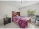 Cozy bedroom with a full-size bed and ample closet space at 2907 Willow Oak Ct, Kissimmee, FL 34744