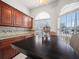 Kitchen breakfast nook with a dark wood table and chairs at 2907 Willow Oak Ct, Kissimmee, FL 34744