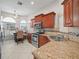 Modern kitchen with granite countertops and stainless steel appliances at 2907 Willow Oak Ct, Kissimmee, FL 34744