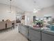 Open living room and kitchen area with tile floors at 2907 Willow Oak Ct, Kissimmee, FL 34744